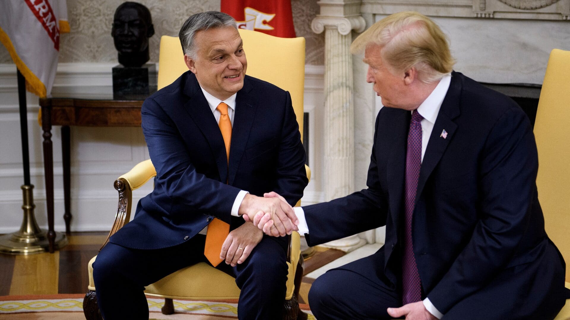 Hungarian Prime Minister Viktor Orbán and US President Donald Trump shake hands before a meeting in the Oval Office on 13 May 2019 in Washington, DC