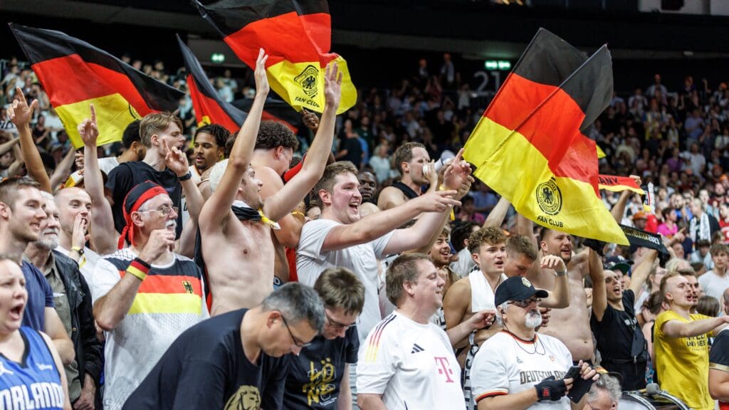 Fans of the German national team cheer after the victory of the German national basket team against Japan on 19 July 2024 in Berlin.