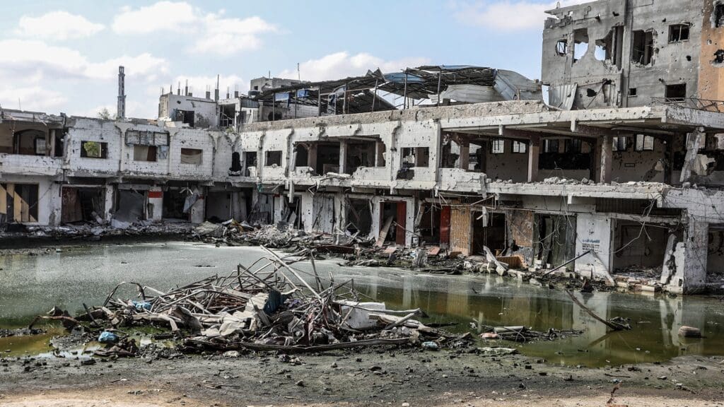Wastewater, rubble and completely destroyed residential buildings are seen after the IDF withdrew following its attacks in Khan Yunis, Gaza on 1 July 2024.