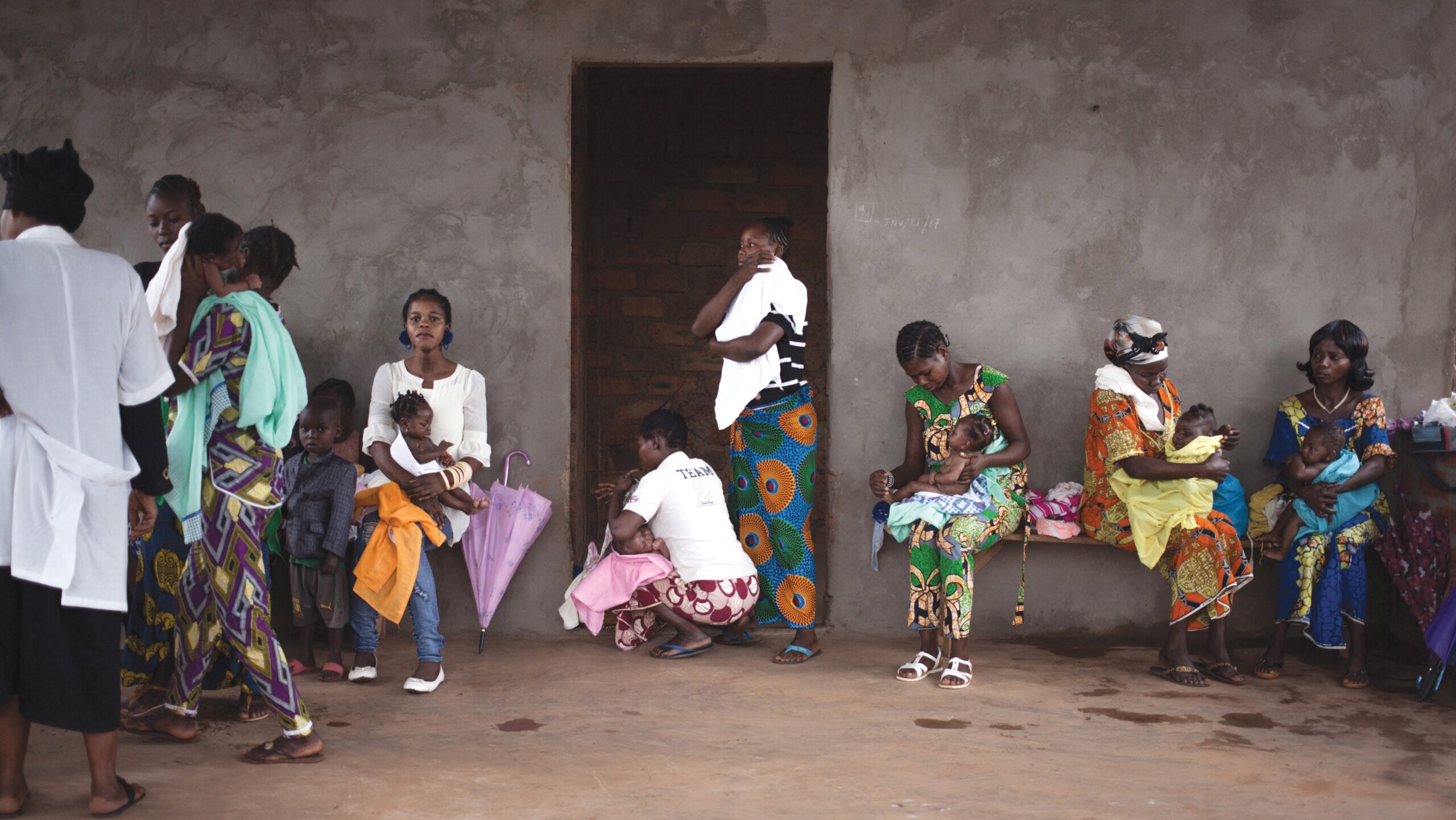 Young mothers wait to weigh their children on 14 February 2018, at the maternity centre in Boali, which has no running water, and only one doctor. In Central Africa, one in 24 children dies during its first month of life, the second worst neonatal death rate in the world, according to a report released by UNICEF