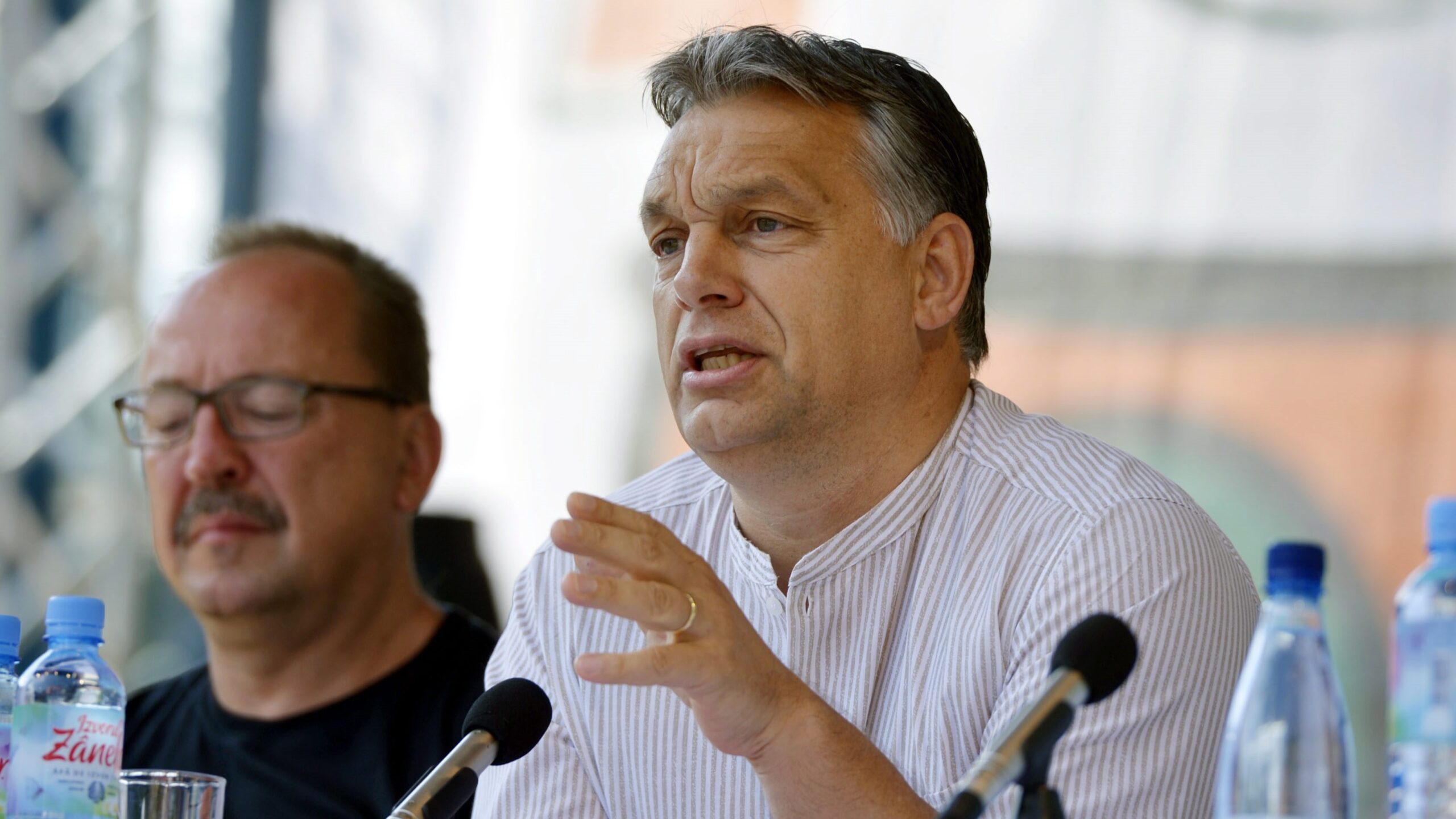 Viktor Orbán delivers his remarks at the Tusványos Summer University on 26 July 2014. Sitting next to him is Chairman of the Foreign Affairs Committee of the Hungarian National Assembly Zsolt Németh (L)