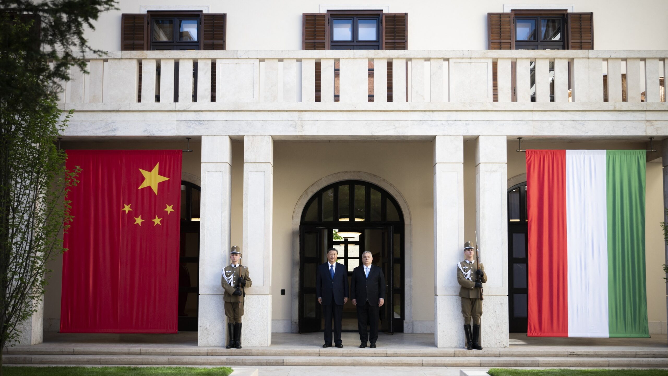 Chinese President Xi Jinping (CL) and Hungarian Prime Minister Viktor Orbán (CR) stand in front of the Carmelita Monastery in Budapest prior to their official talks on 9 May 2024.