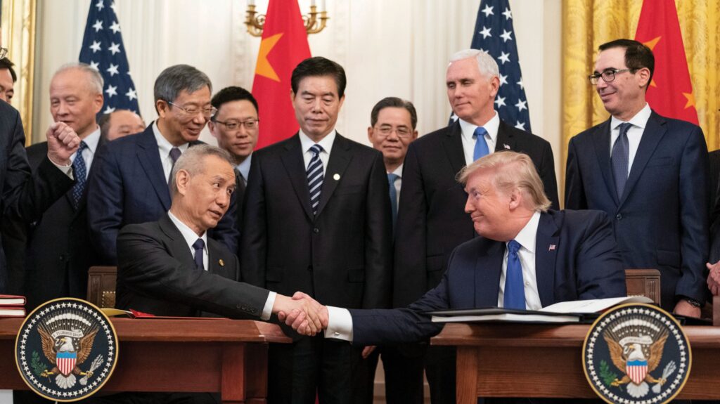 President Donald J. Trump, joined by Chinese Vice Premier Liu He, sign the U.S. China Phase One Trade Agreement in the East Room of the White House on 15 January 2020