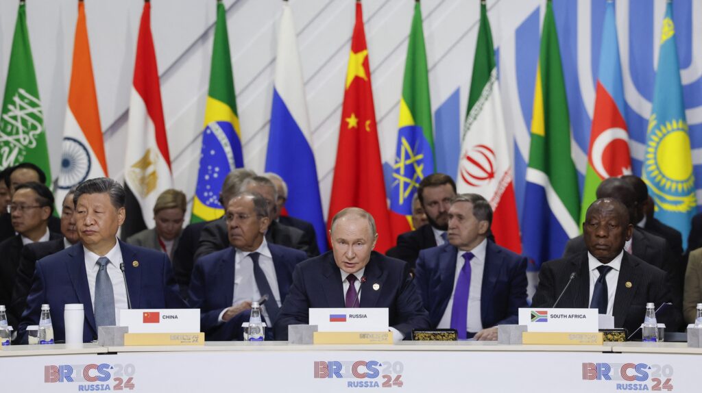 Officials, including South Africa's President Cyril Ramaphosa, Russia's President Vladimir Putin and China's President Xi Jinping, attend a plenary session in the outreach/BRICS Plus format at the BRICS summit in Kazan on 24 October 2024.