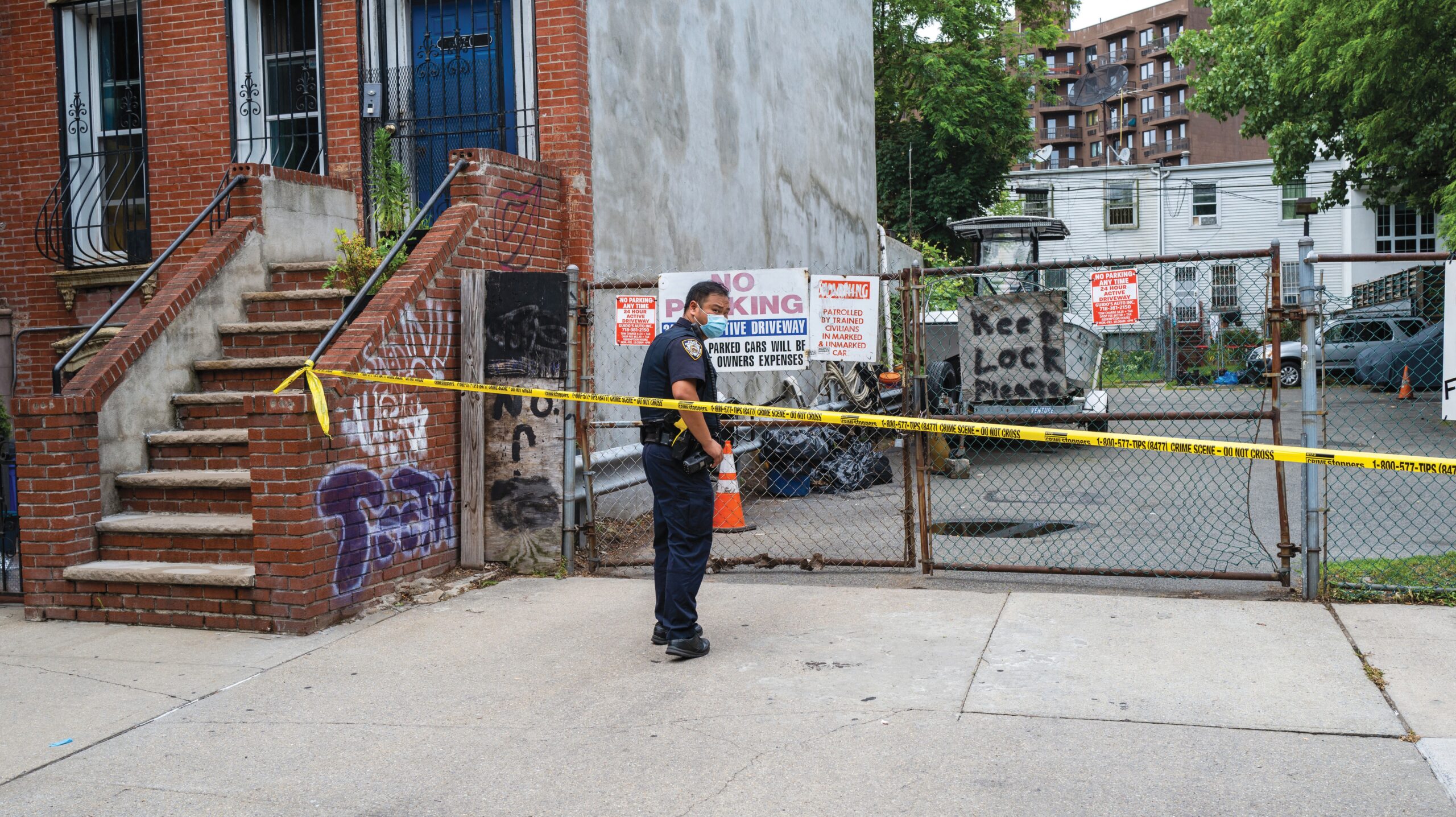 Police gather at the scene of a shooting in Brooklyn that left one person dead in New York City, USA, 16 June 2022.