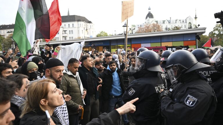 German police confront pro-Palestine supporters in Berlin on the first anniversary of the Hamas terrorist attacks on 7 October 2024.