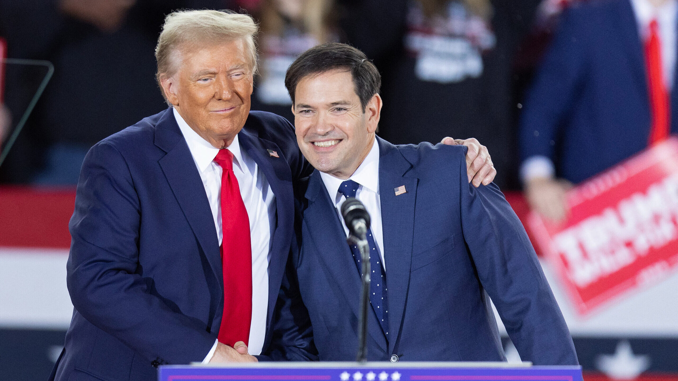 President-elect Donald Trump (L) with US Senator Marco Rubio (R-FL) during a campaign rally at the J.S. Dorton Arena in Raleigh, North Carolina, on 4 November 2024