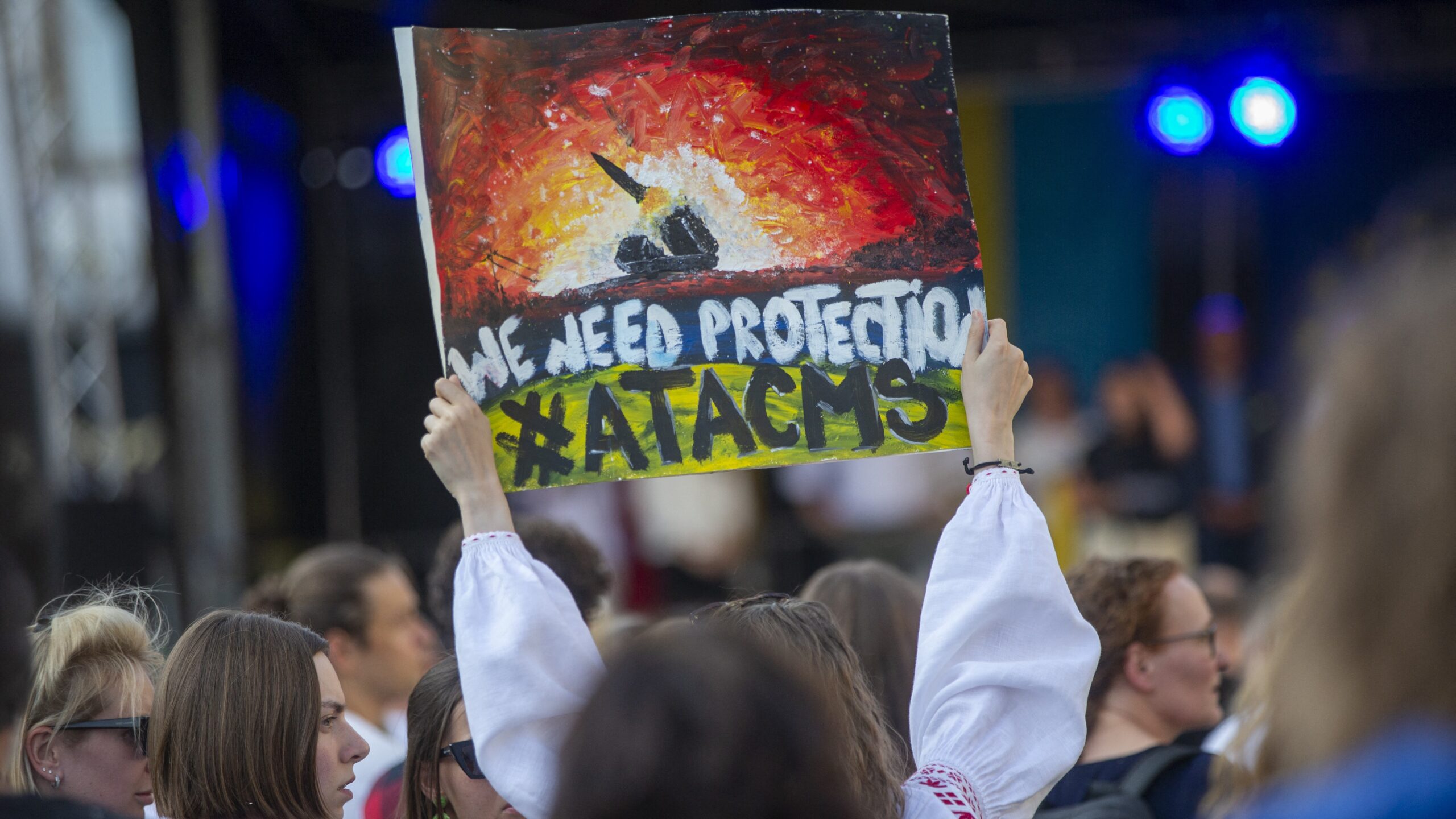 A participant holds a sign with the inscription: ‘We need Protection #ATACMS’ at the rally of the Blue-Yellow Cross association for Ukraine's Independence Day in Cologne, Germany on 24 August 2024.