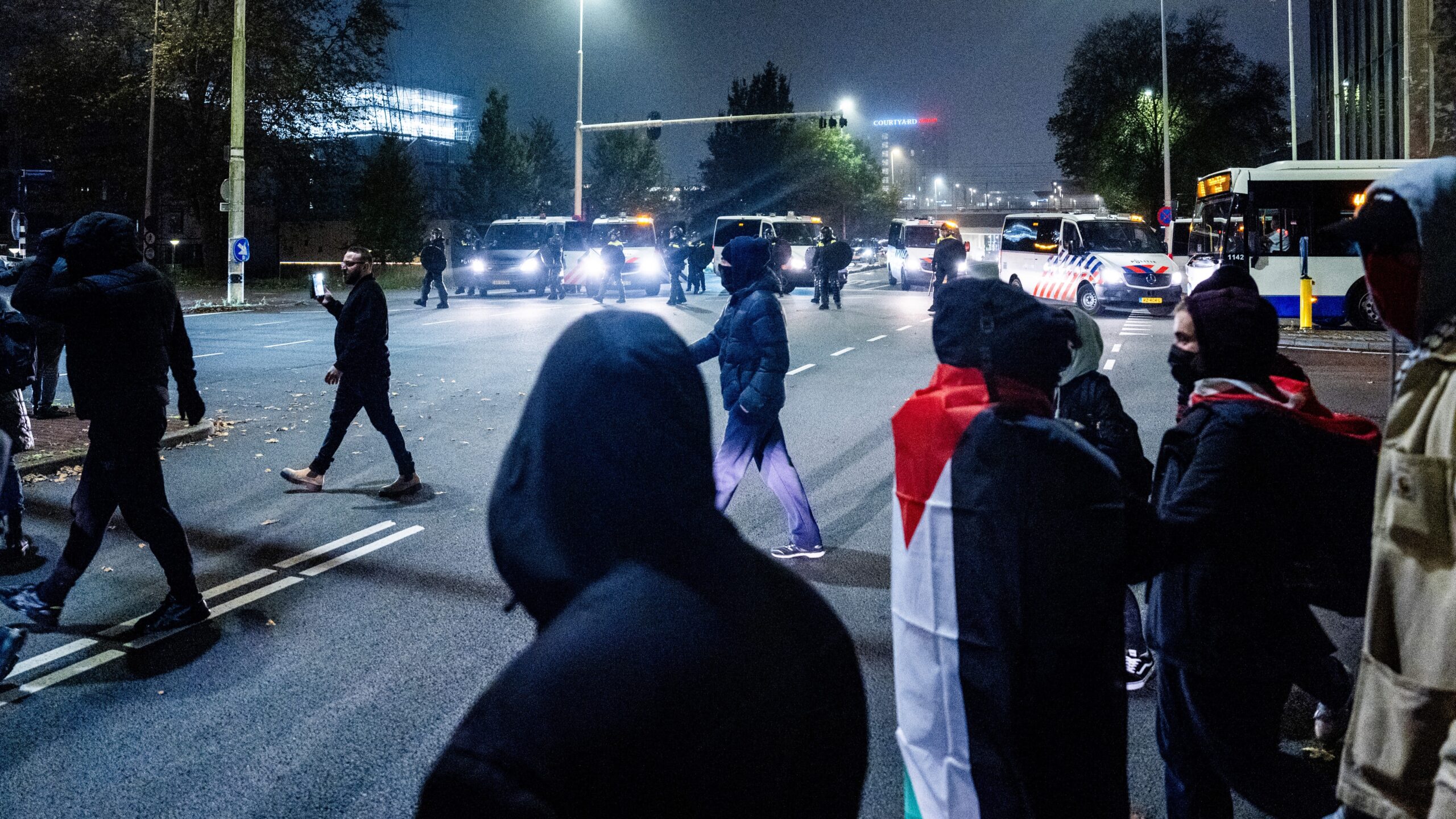 Protesters with Palestinian flags take part in a pro-Palestinian demonstration ahead of the UEFA Europa League football match between Ajax Amsterdam and Maccabi Tel Aviv in Amsterdam on 7 November 2024.