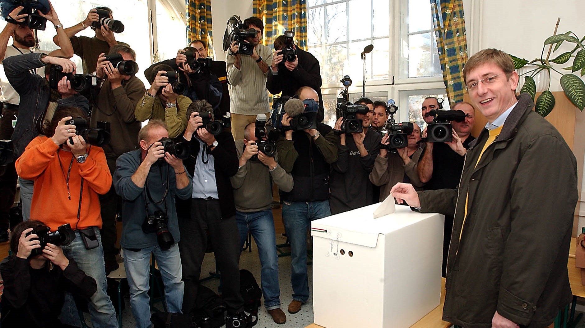 Former Prime Minister Ferenc Gyurcsány casting his vote in the national referendum on dual citizenship