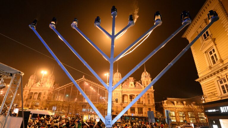 A giant Menorah, a nine-branched candelabrum is seen on the last day of the eight-day Jewish festival of lights, the Hanukkah, at Nyugati square of Budapest in front of the building of Westend railway station, a construction of French arhitecht Gustave Eiffel on December 4, 2013.