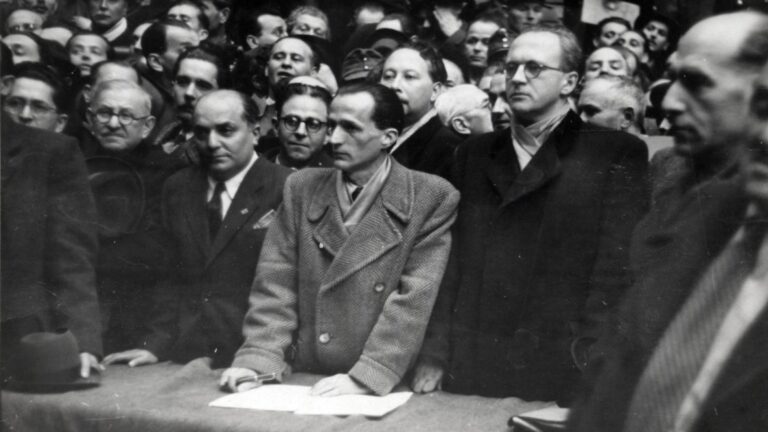 Members of a People's Court Council attend an execution in the courtyard of the Capital City Court of Law in Markó Street, Budapest on 12 March 1946.